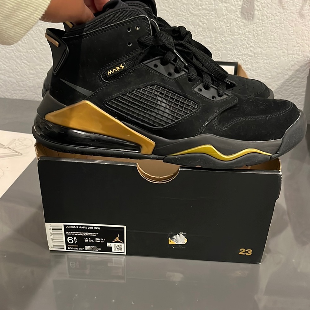 Jordan mars,size 6.5Y, black and gold, used once in perfect codition